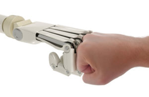robot and human hand fist bump
